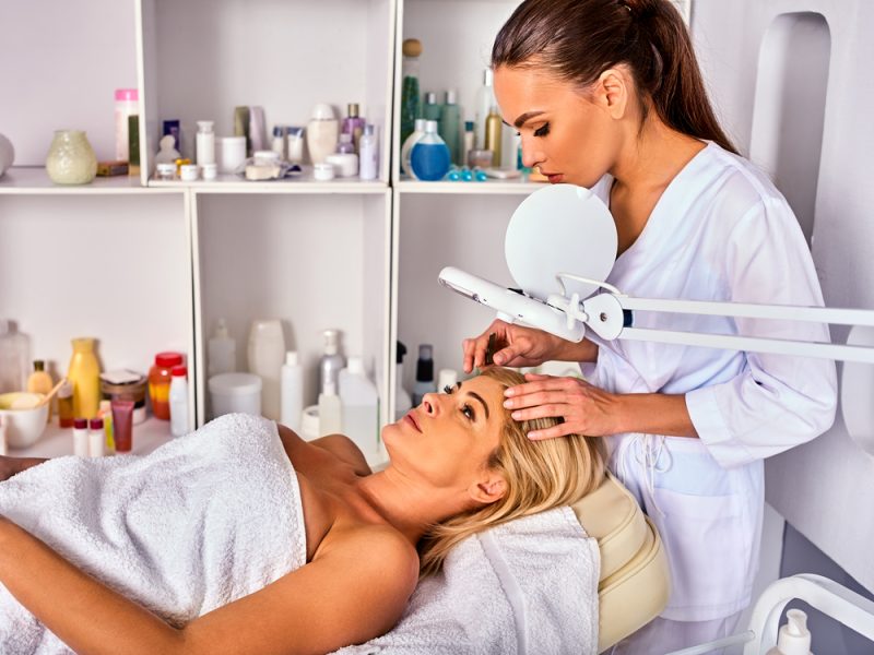 eyebrow-treatment-of-woman-middle-aged-in-spa-salon